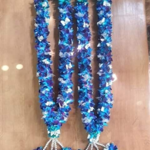 Plane Fresh Blue Orchid Garland - GetFlowersDaily